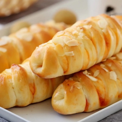 Émulsifiant E471 de catégorie comestible de pureté du monostéarate GMS DMG 99% de glycérol de FDA pour la boulangerie